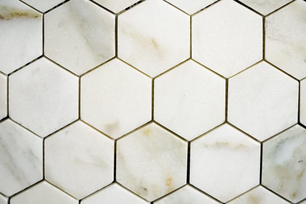 Hexagon Mosaic 2” Calacatta Gold with marbled appearance